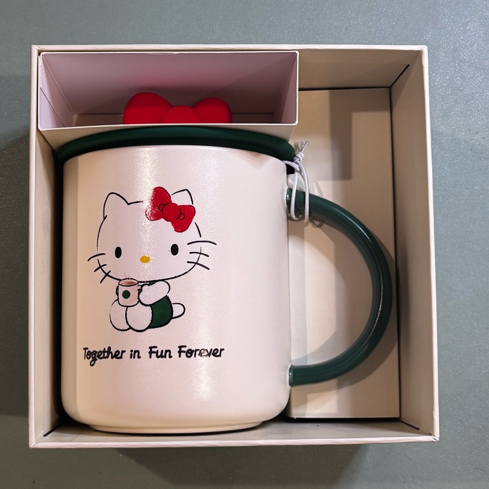NWT♥️2025 Starbucks Hello Kitty Ceramic Mug with Silicon Red Bow and Green Lid - Picture 1 of 5